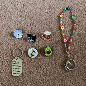 Assorted pins and keychains